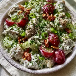 Macro shot of Healthy Chicken Salad Recipes showing the creamy texture of Greek yogurt dressing and fresh scallions.
